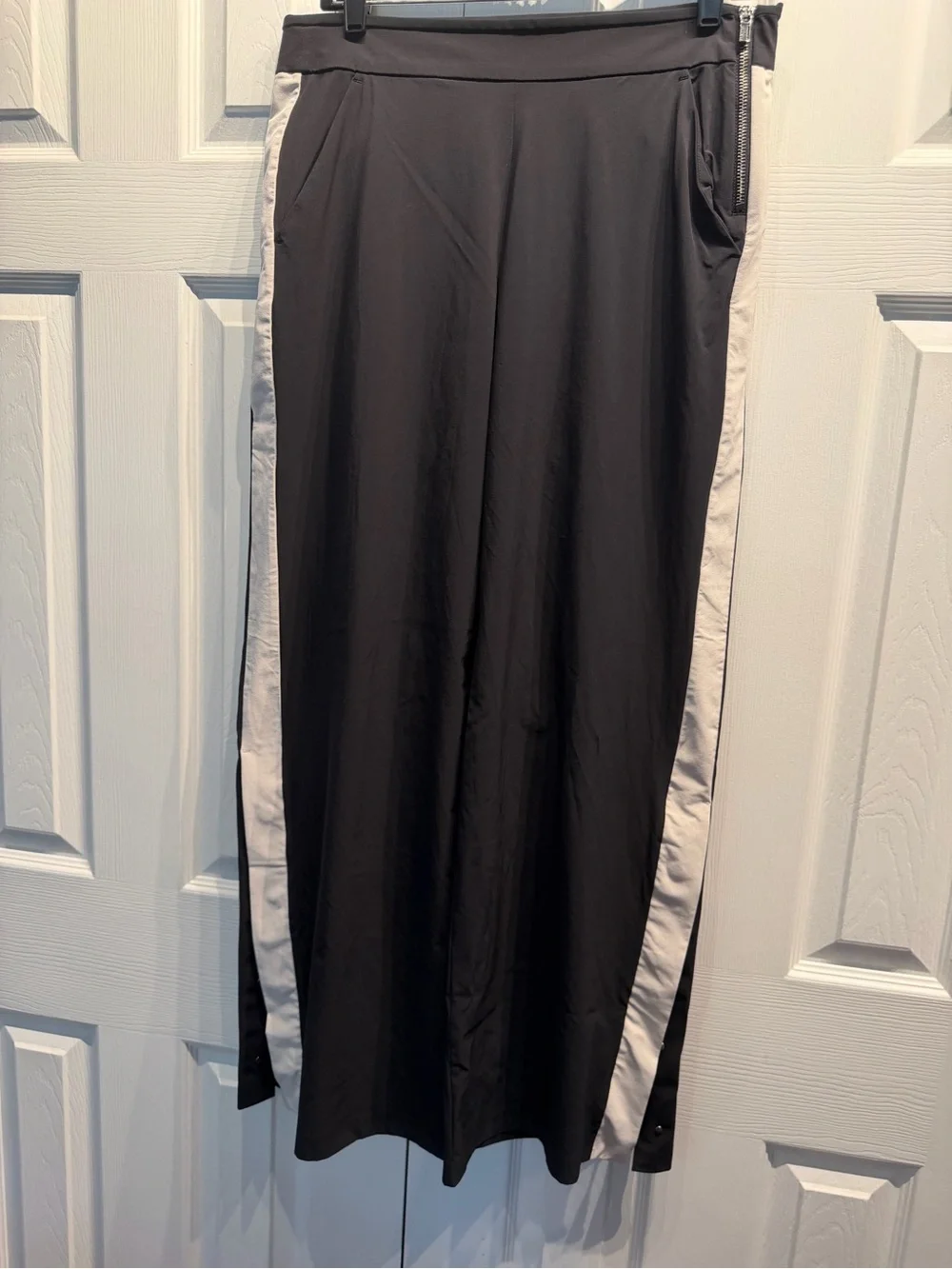 Athleta Gramercy Luxe Track wide-leg black pants with light contrast side stripe